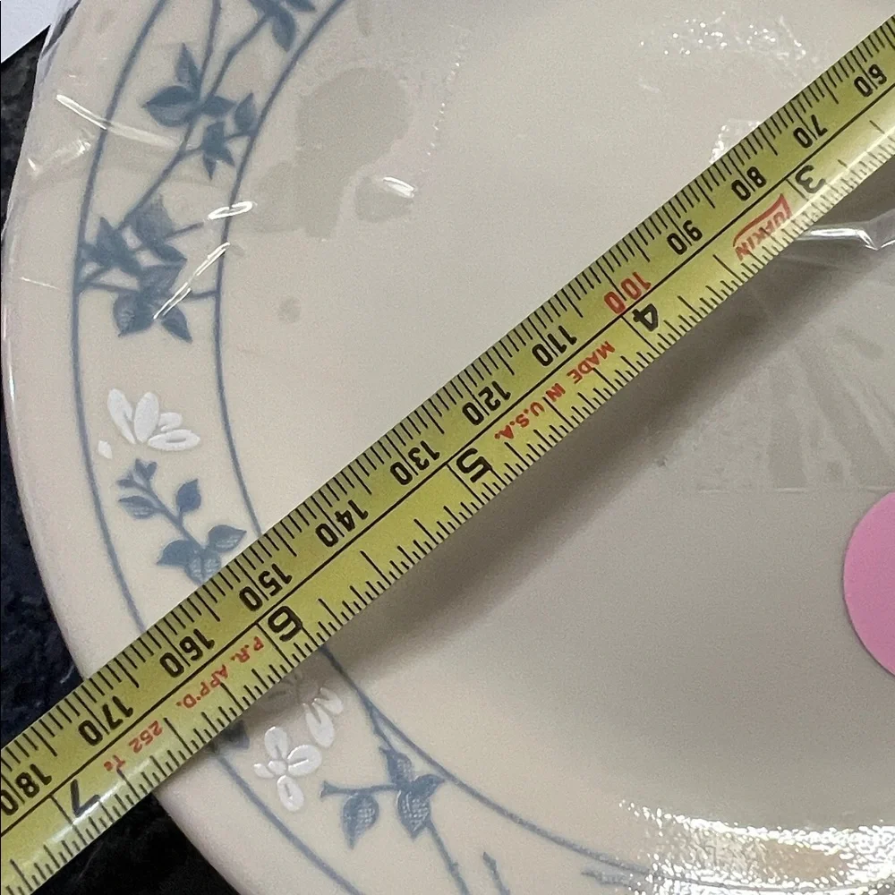 Set of 4 Salad plates by Corelle. FIRST OF SPRING. Exc condition